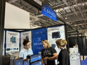 Visitors at the SOARLID drone battery booth, DroneX 2026 London