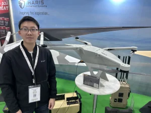 CGBT team member in the drone hall at IDEX 2025