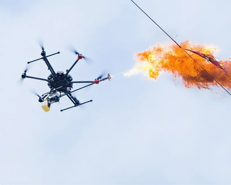 Hexacopter clearing a foreign object from a power line