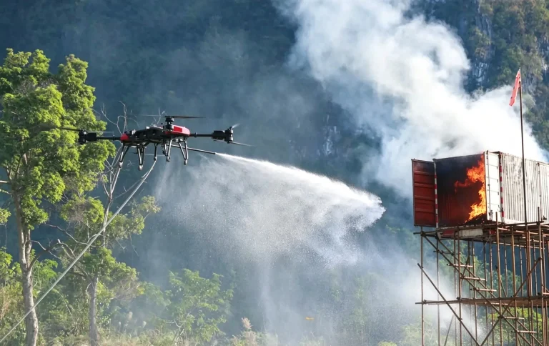 Firefighting drone spraying water on a burning structure